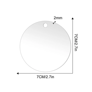 Detail view of 7cm clear acrylic ornament blank showing 2mm thickness and pre-drilled hole