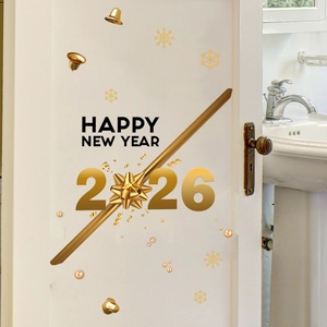 Detail of 2026 Happy New Year wall sticker with golden bow and snow on white door