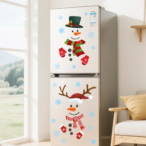 DIY Christmas snowman stickers with green hat and striped scarf on white refrigerator