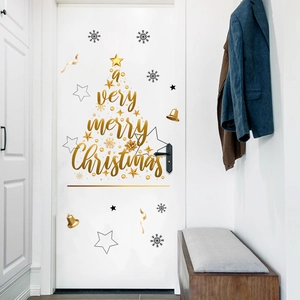 Detail of Christmas tree door sticker with merry Christmas lettering and stars decoration