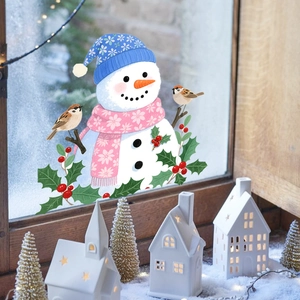 Christmas snowman window static cling with blue hat and floral scarf on frosty glass