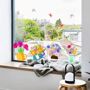Detailed static window clings featuring colorful potted plants and butterfly decorations