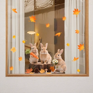 Détail de stickers de fenêtre d'automne avec lapins, feuilles d'érable et champignons