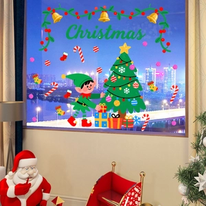 Christmas window decals with elf, tree, and festive gifts on a clear glass background