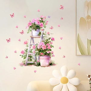 Detail of watercolor pink roses and butterflies wall decal on white wooden ladder