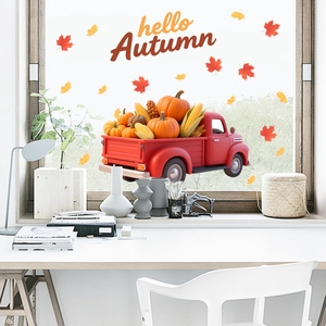 Detail of harvest window clings with red vintage truck, maple leaves and hello autumn text