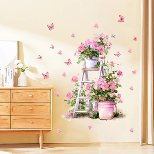 Detail showing watercolor pink roses on a white ladder with butterflies wall sticker