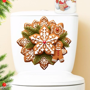Detailed Christmas gingerbread man wreath decal applied to a white ceramic toilet tank