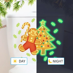 Luminous Christmas tree and gingerbread man wall stickers showing day and night glowing effects