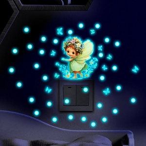 Luminous wall sticker showing glowing blue fairy and butterflies around a light switch
