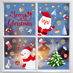 Detail of Santa Claus and snowman window stickers with Merry Christmas text on glass