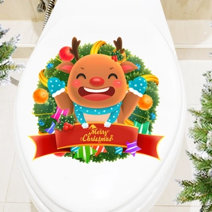 Détail de l'autocollant de toilette renne de Noël avec couronne et texte Merry Christmas