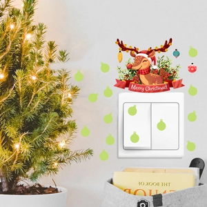 Luminous Christmas reindeer wall sticker with glow in the dark stars for light switch