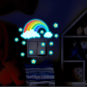 Glow-in-the-dark rainbow and star wall stickers showing vibrant fluorescent light in the dark