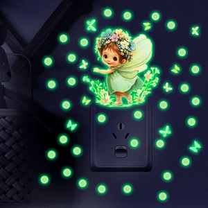 Glow in the dark wall stickers showing fairy and butterflies around a light switch