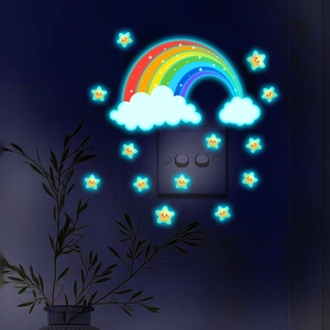 Glow in the dark rainbow and smiling star wall stickers around a light switch in the dark