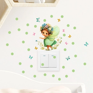 Luminous fairy wall sticker with butterflies applied around a power switch
