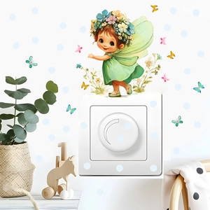 Detail showing a cute fairy and butterfly wall sticker applied around a light switch
