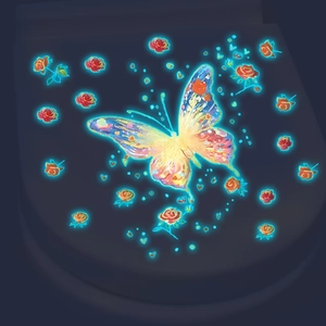 Luminous glow in the dark butterfly and red roses wall stickers on a dark background