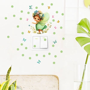 Close-up of cute fairy wall stickers with butterflies and dots around light switch