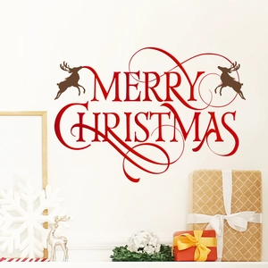 Stickers muraux de Noël avec texte Merry Christmas rouge et rennes sur un mur blanc