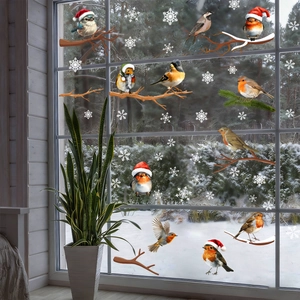 Christmas window decals set with realistic birds, snowflakes and tree branches on glass