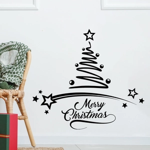 Detail of black Merry Christmas tree wall sticker with stars in cozy room interior