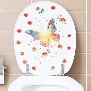 Luminous butterfly and orange roses sticker applied on a white toilet lid in a cozy bathroom