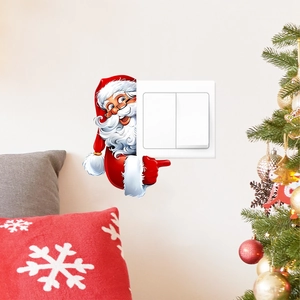 Vue détaillée du sticker mural Père Noël décorant un interrupteur pour Noël