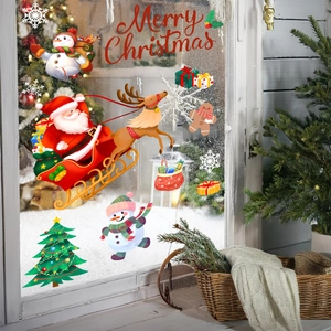 Detailed Santa Claus on sleigh window stickers and Merry Christmas decals on glass