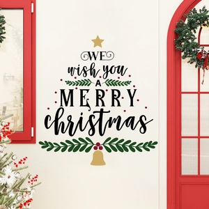 Close-up of Christmas tree wall decal with festive lettering, stars and bells