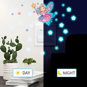 Luminous fairy and stars wall stickers set shown in day and night lighting contrast