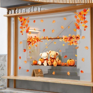 Autumn static window clings featuring cute teddy bears on a swing with maple leaves