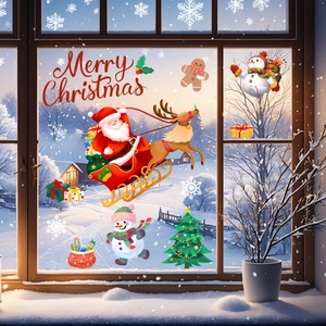 Detailed view of Christmas window stickers featuring Santa, reindeer, and snowflakes