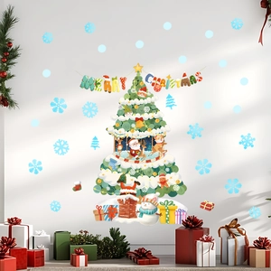 Detailed view of luminous Christmas wall stickers featuring a tree, snowman and snowflakes