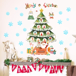 Detailed close-up of luminous Christmas tree wall stickers with Merry Christmas typography