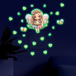 Glow in the dark wall stickers featuring a sitting fairy with glowing hearts and butterflies