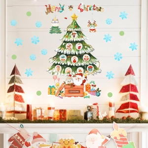 Festive Christmas tree and Santa wall stickers displayed above a cozy living room fireplace