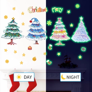 Glow in the dark Christmas tree wall stickers showing Day and Night effect contrast