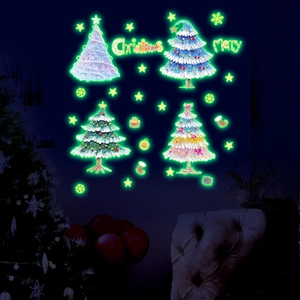 Luminous Christmas tree wall stickers glowing green in the dark for festive bedroom decor