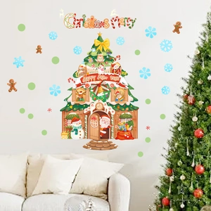 Cozy room scene showing glow-in-the-dark Christmas tree wall decals with Santa and snowmen