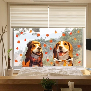 Detail showing cartoon beagle dogs and maple leaf static window stickers for autumn decor