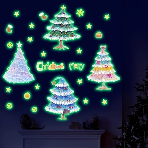 Detail of glow in the dark Christmas tree wall stickers set with stars and gift boxes