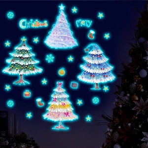 Glow-in-the-dark Christmas tree wall stickers featuring blue fluorescent snowflakes and stars