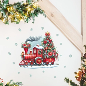 Detail of red Christmas train wall decal with tree and snowflakes on white wall surface