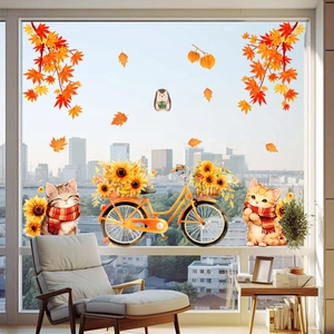 Détail des stickers de chatons et feuilles d'érable pour fenêtre d'automne