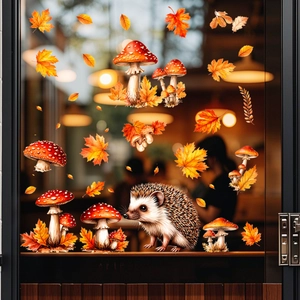 Autumn window stickers set with colorful maple leaves, mushrooms and cute hedgehog decals