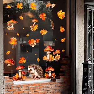 Detail of autumn window stickers with maple leaves, mushrooms and a cute hedgehog