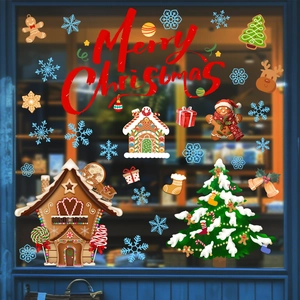 Christmas window decals featuring gingerbread house, tree, and snowflake stickers