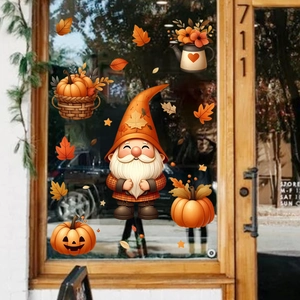 Detailed shop window view of festive Thanksgiving gnome and pumpkin glass stickers